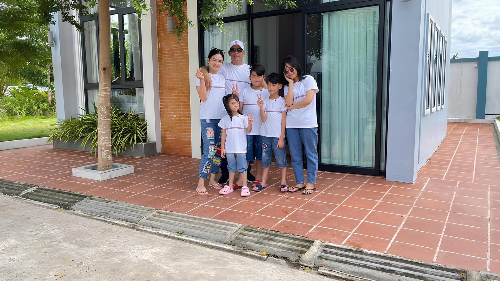 Family in Front of our Luxury Villa in Kampot - Damnak Borey Resort