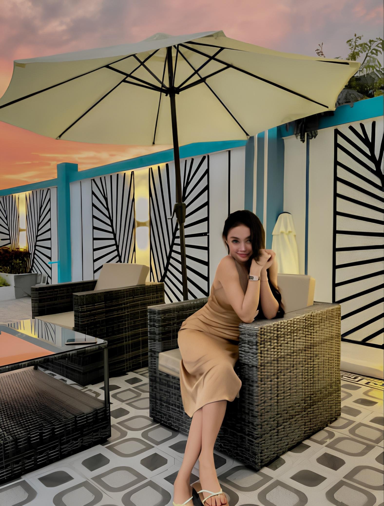 Woman sitting at Damnak borey resort in kampot